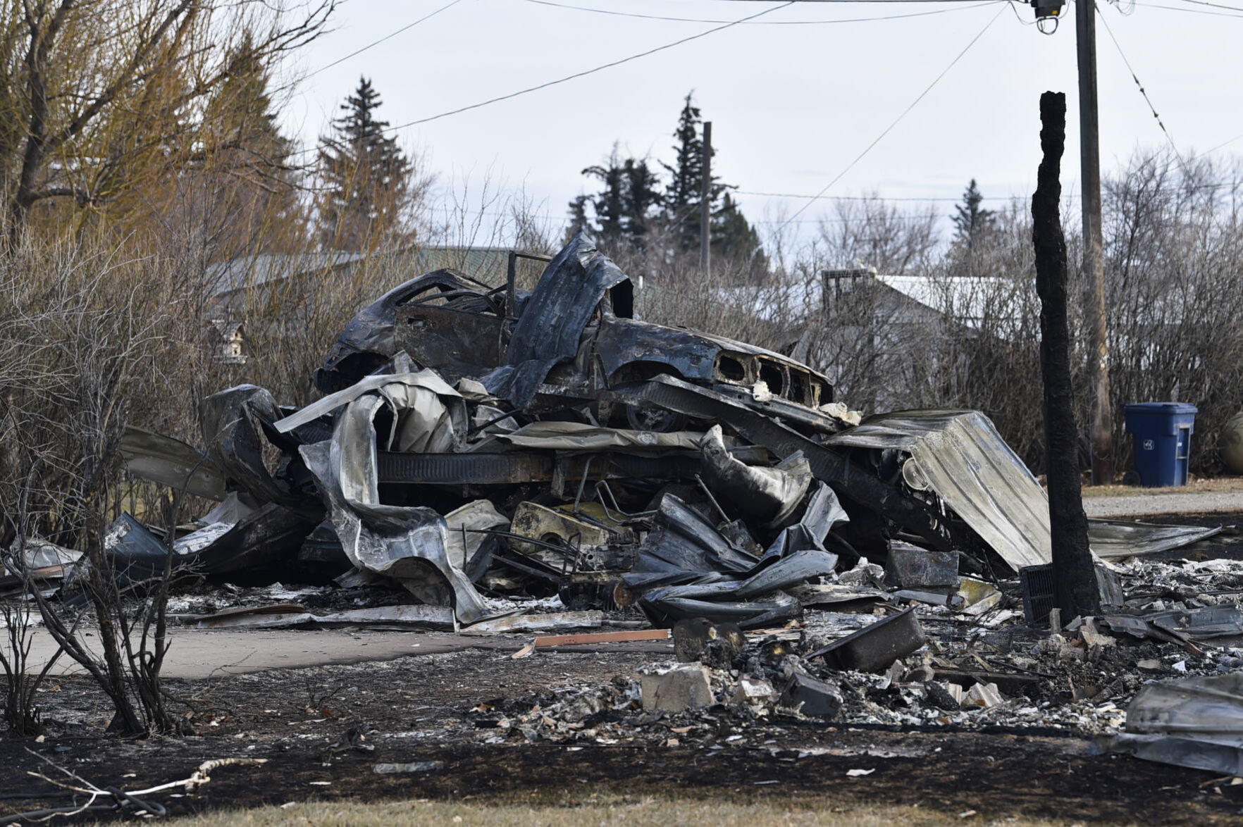 The remains of a house burned by the West Wind Fire